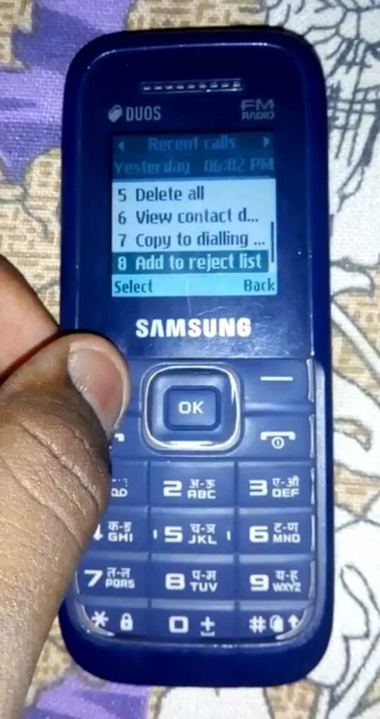 How to block numbers in Samsung keypad phone 4 select add to reject list option in Samsung feature phone to add number to block list