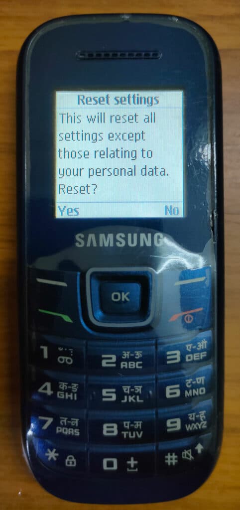 samsung keypad phone reset settings warning